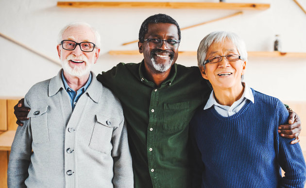 three senior man wearing eyeglasses smiling